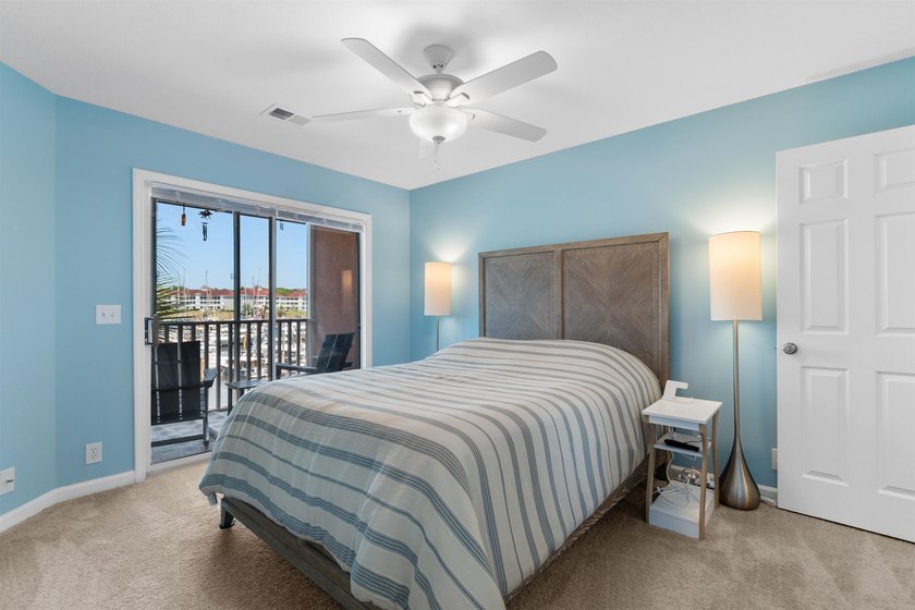 Wake up to beautiful marina views from this partially furnished - photo 18