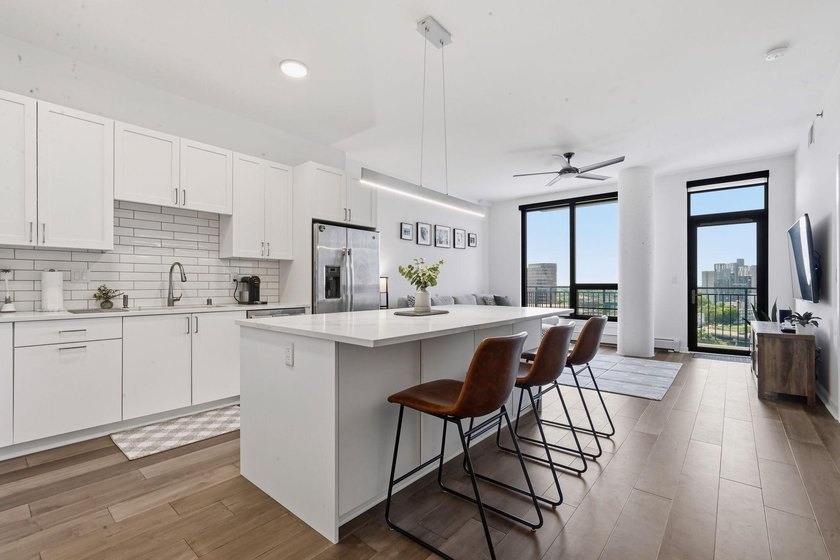 South facing unit filled with natural light, 2 garage stalls - photo 7
