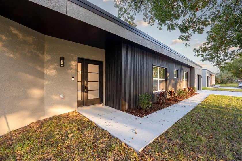 Life at 455 Riverview Avenue begins beneath the quiet canopy of - photo 5