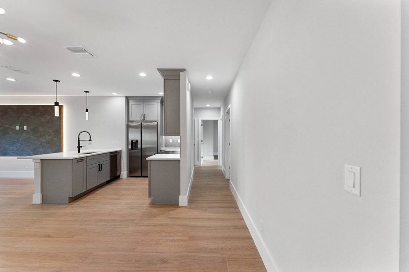 Life at 455 Riverview Avenue begins beneath the quiet canopy of - photo 10