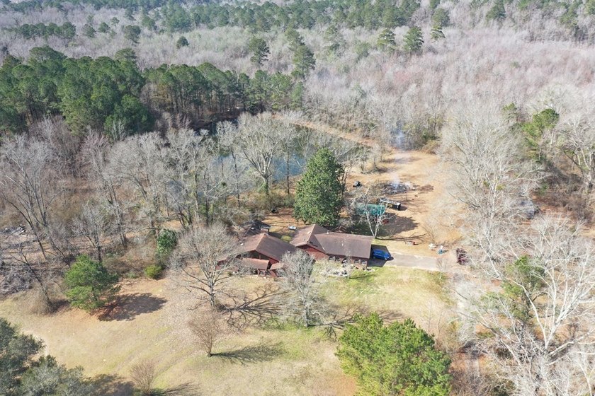Private location. Nice home that needs some love. Over 47 acres - photo 15