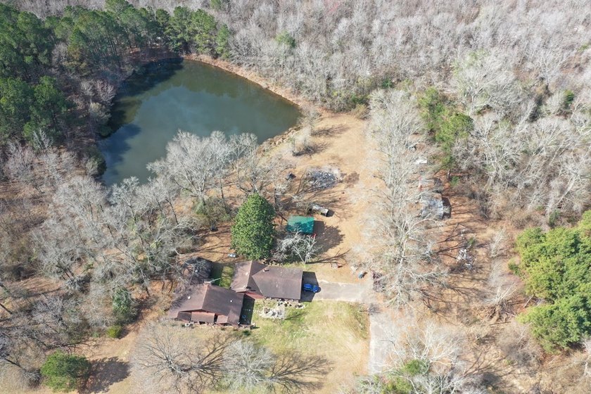 Private location. Nice home that needs some love. Over 47 acres - photo 18