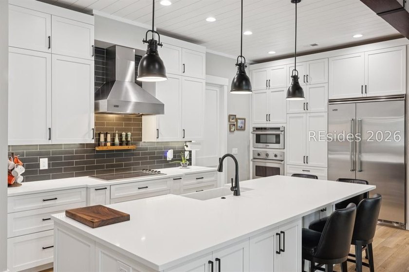 Step into a truly exceptional marshfront retreat where modern - photo 14