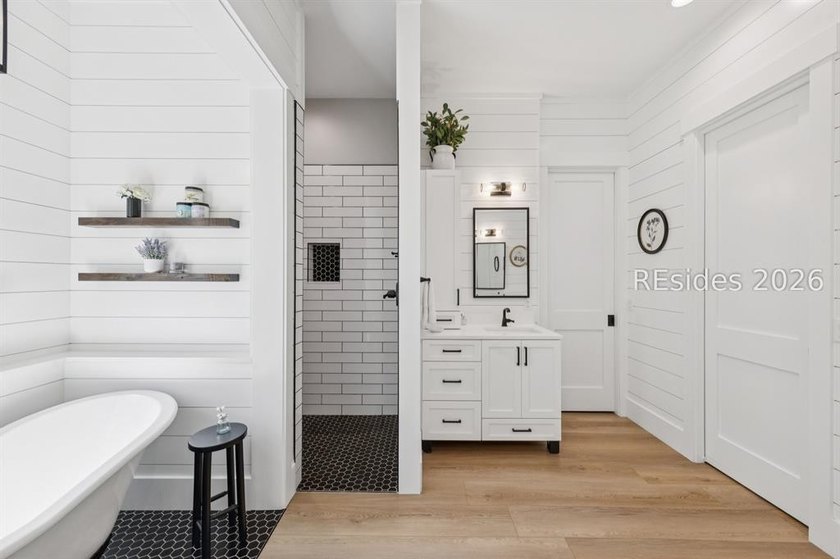Step into a truly exceptional marshfront retreat where modern - photo 25