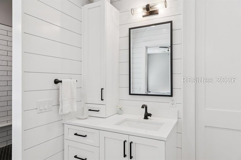 Step into a truly exceptional marshfront retreat where modern - photo 26