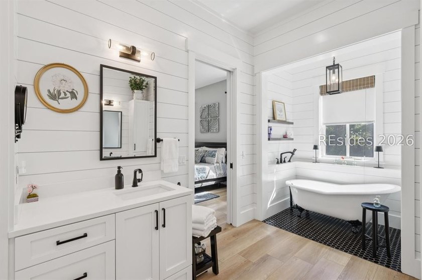 Step into a truly exceptional marshfront retreat where modern - photo 28