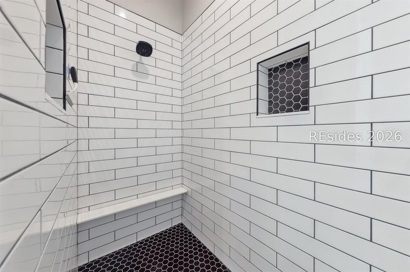 Step into a truly exceptional marshfront retreat where modern - photo 30