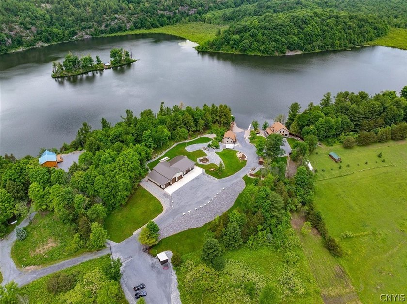 Welcome to your private Payne Lake compound - a rare waterfront - photo 3