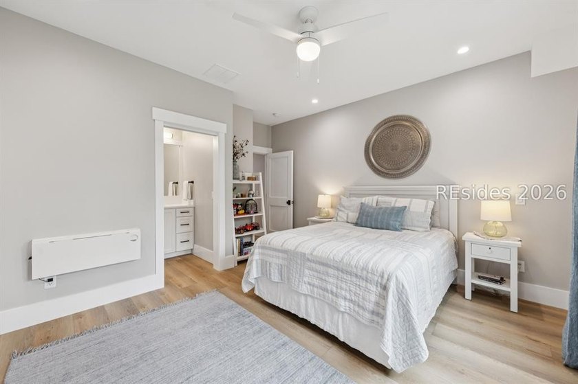 Step into a truly exceptional marshfront retreat where modern - photo 41