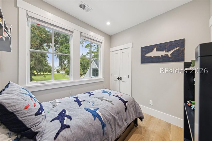 Step into a truly exceptional marshfront retreat where modern - photo 43