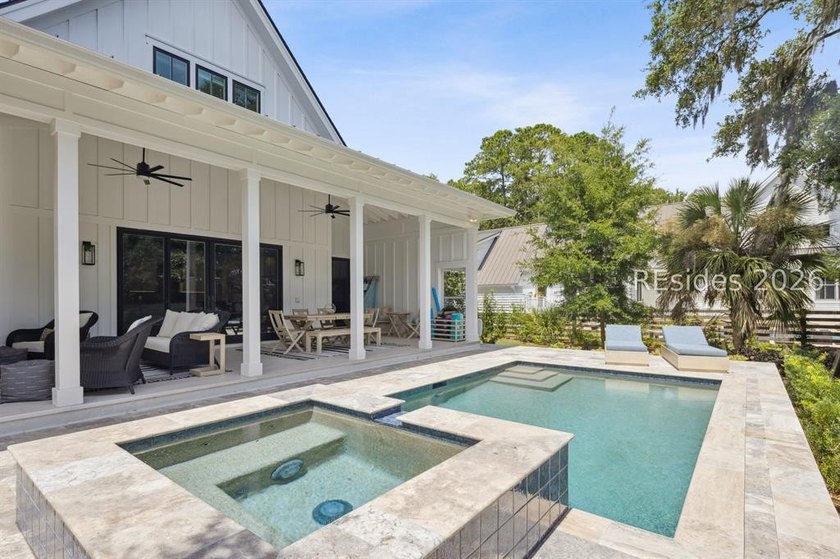 Step into a truly exceptional marshfront retreat where modern - photo 49