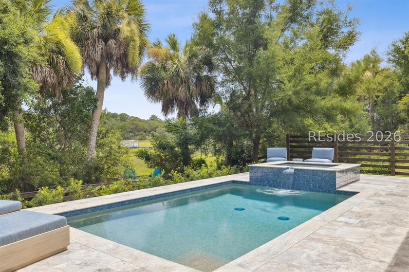 Step into a truly exceptional marshfront retreat where modern - photo 50