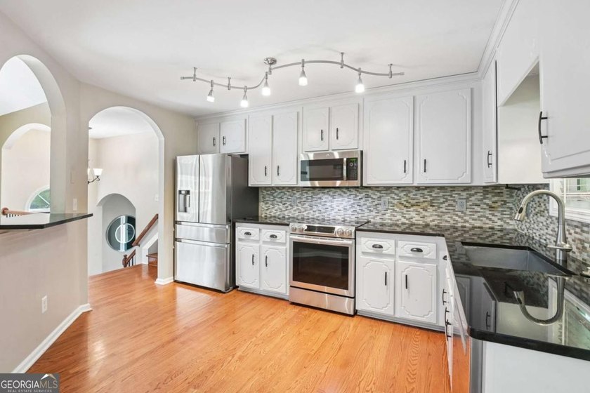 Welcome home to this beautifully updated split-level retreat - photo 8