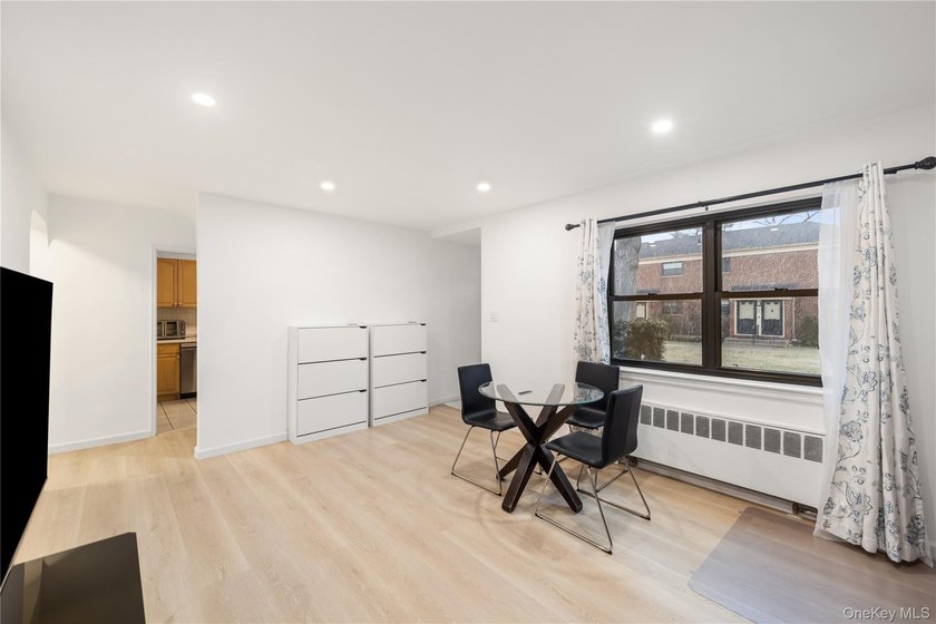 Welcome to this spacious and well-maintained 1st-floor unit in - photo 7