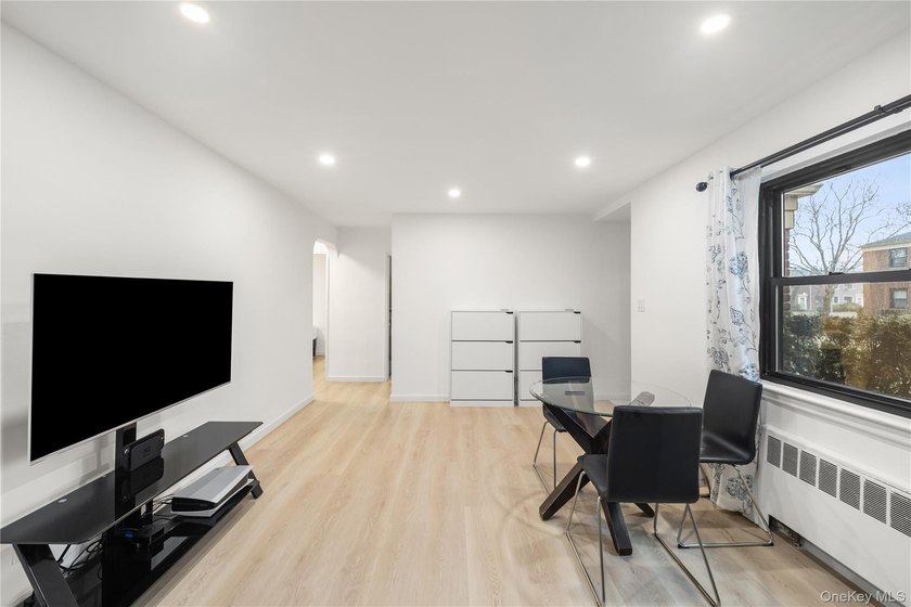 Welcome to this spacious and well-maintained 1st-floor unit in - photo 8
