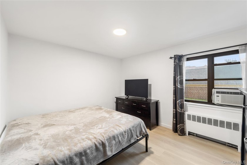 Welcome to this spacious and well-maintained 1st-floor unit in - photo 9