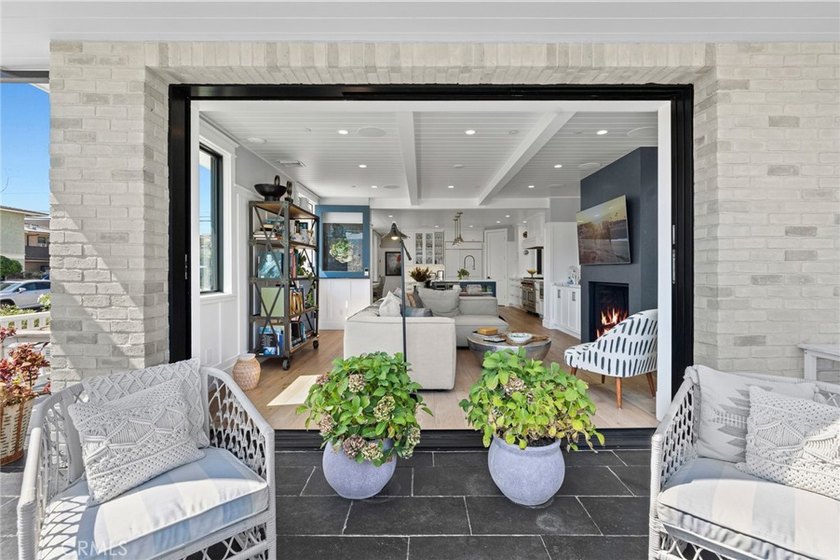 Indulge in luxurious coastal living with this fully furnished - photo 9