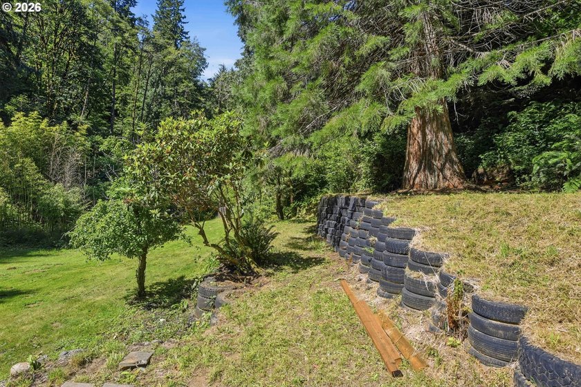 Tucked away at the end of a private driveway, this secluded and - photo 6