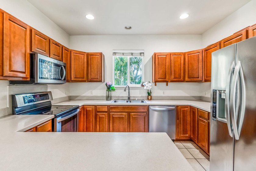 OFFERED BELOW APPRAISED VALUE. Welcome to 206 Oluea Circle, a - photo 12