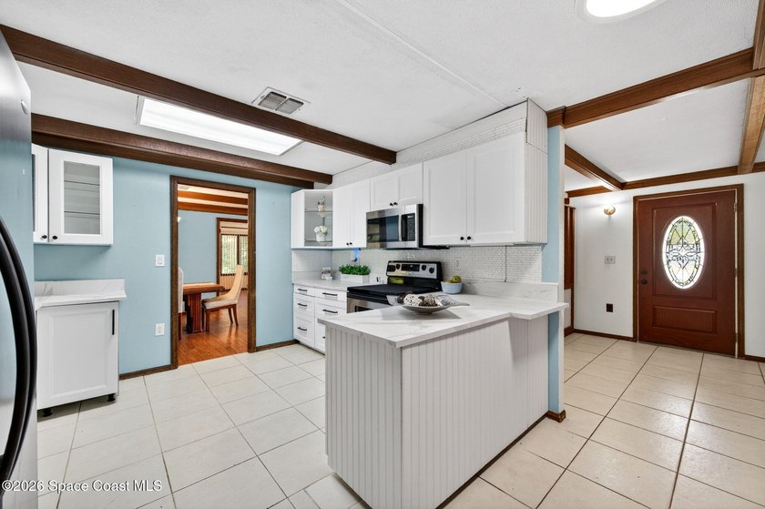 Welcome home to this charming 3 bedroom, 2 bath pool home on a - photo 20