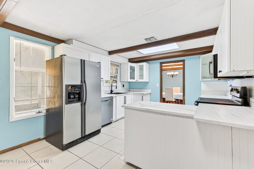 Welcome home to this charming 3 bedroom, 2 bath pool home on a - photo 22