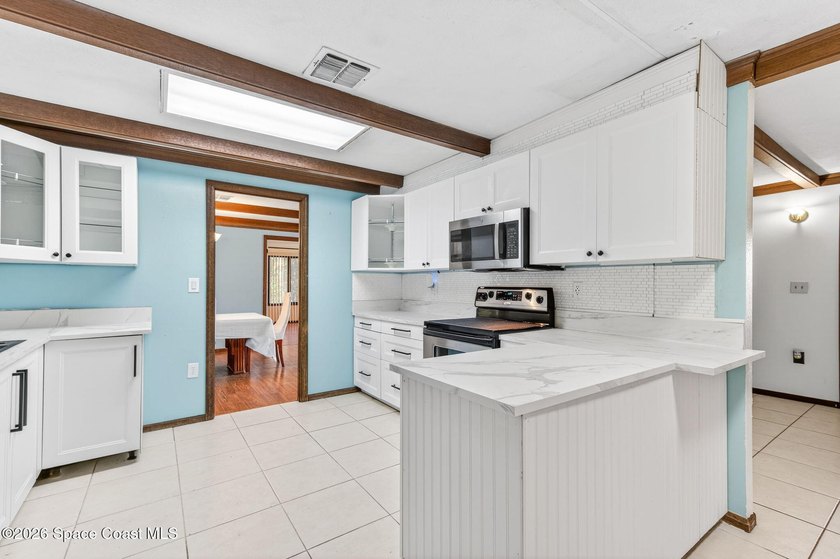 Welcome home to this charming 3 bedroom, 2 bath pool home on a - photo 23
