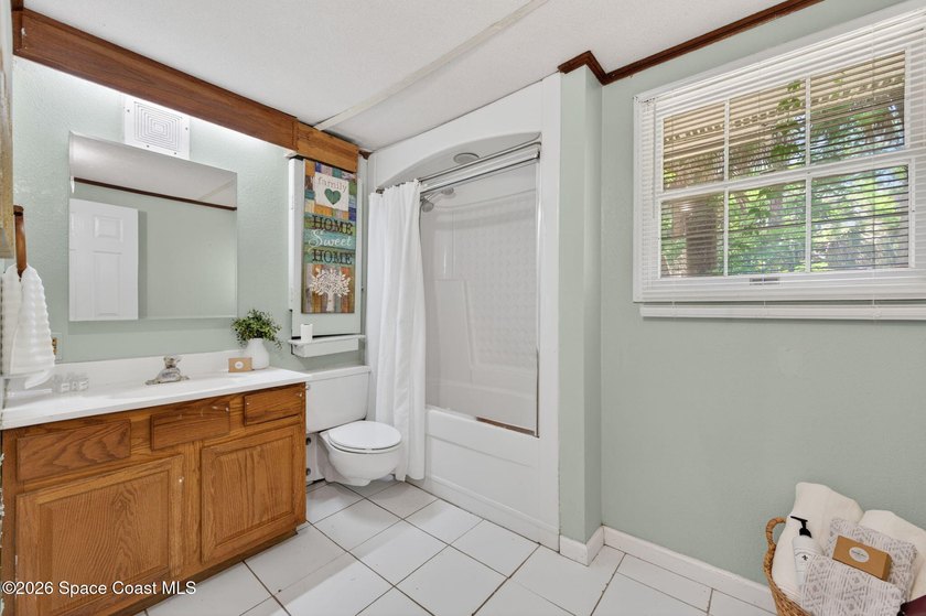 Welcome home to this charming 3 bedroom, 2 bath pool home on a - photo 45