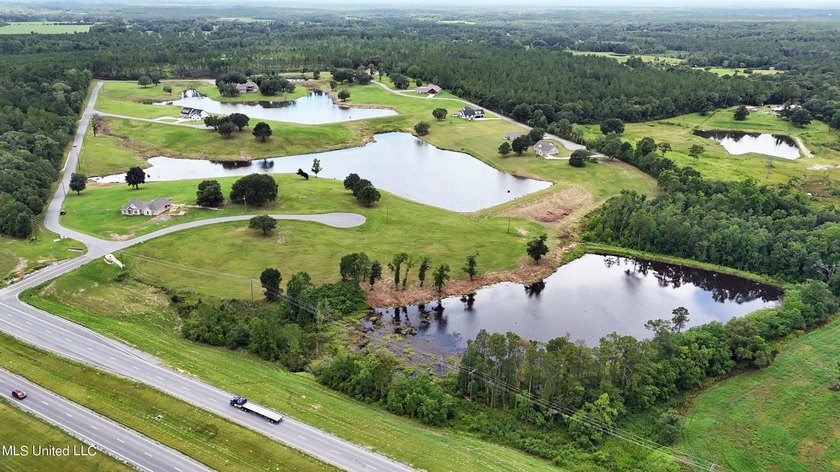 Lake front lots in a beautiful new Subdivision on Highway 63 - photo 5