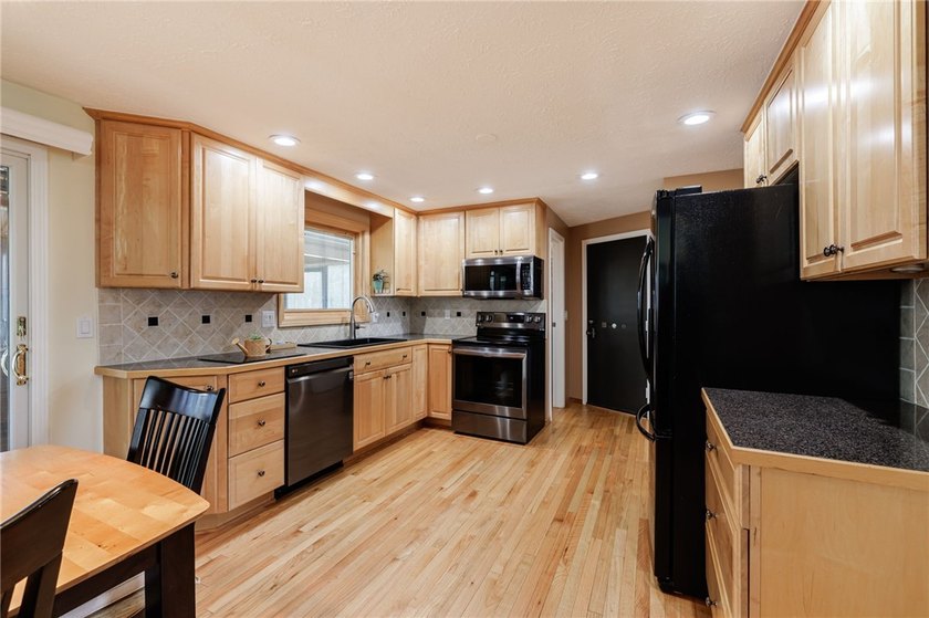 Welcome to this well-maintained home offering a perfect blend of - photo 11