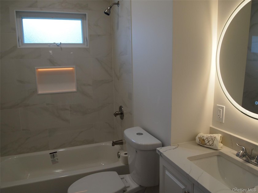 Fall in love with this Fully Renovated Split! 13ft cathedral - photo 14