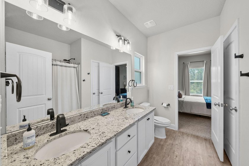 The .62 Acre lot in a serene community is located just 5 minutes - photo 18