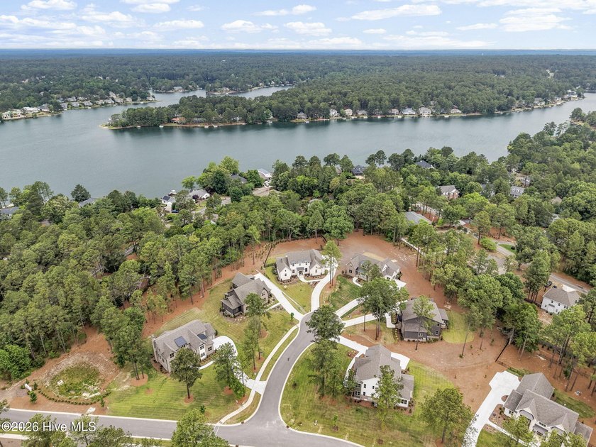 Located just a short stroll from Lake Pinehurst, this - photo 2