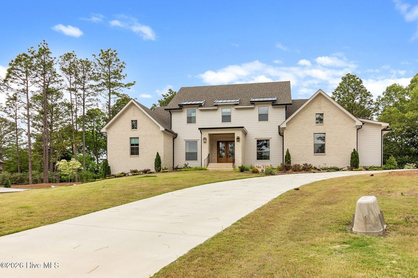 Located just a short stroll from Lake Pinehurst, this - photo 3