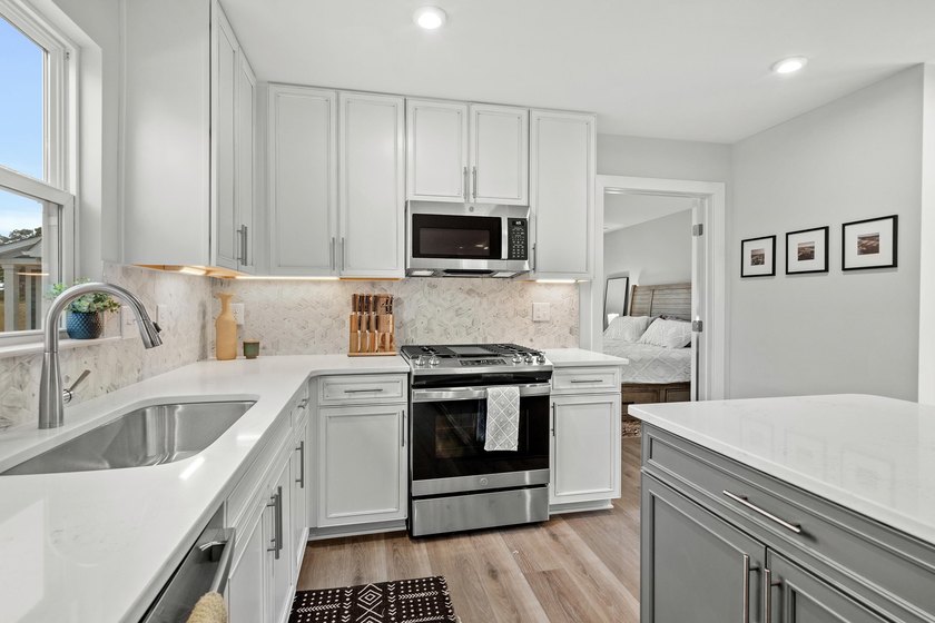 Experience the best of low maintenance living and coastal luxury - photo 11