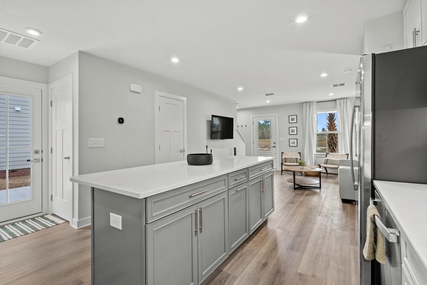 Experience the best of low maintenance living and coastal luxury - photo 12