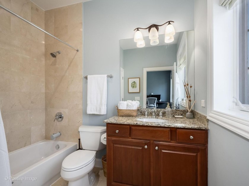 Perfectly situated in Chicago's vibrant Southport Corridor, this - photo 17