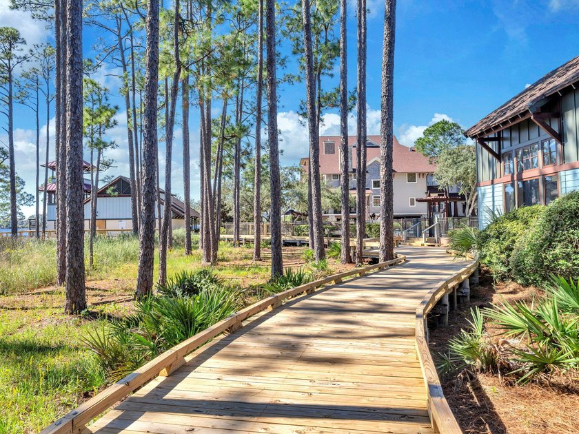 Welcome Home to your exquisite lakefront coastal oasis! Wild - photo 42