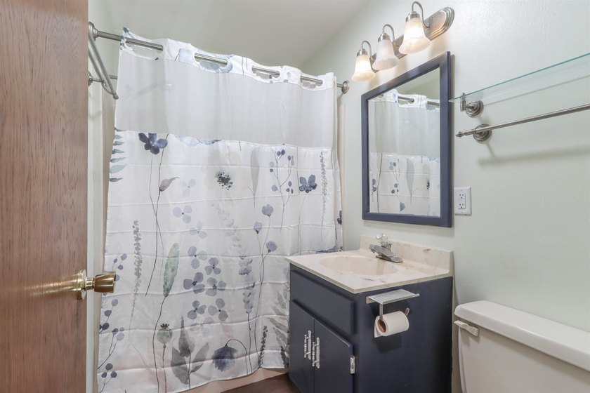 Nestled on two wooded lots just south of Waupaca, this 3BR, 2BA - photo 17
