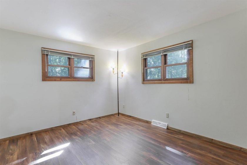Nestled on two wooded lots just south of Waupaca, this 3BR, 2BA - photo 21
