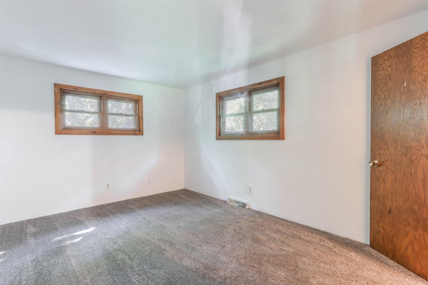 Nestled on two wooded lots just south of Waupaca, this 3BR, 2BA - photo 27