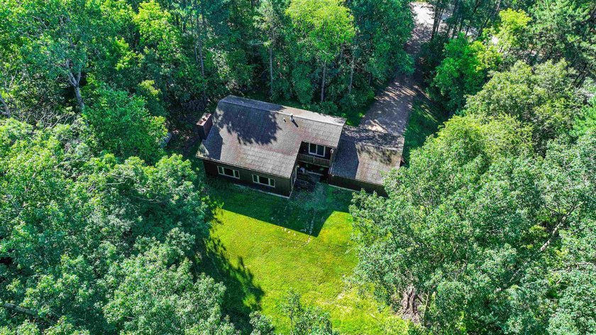 Nestled on two wooded lots just south of Waupaca, this 3BR, 2BA - photo 40