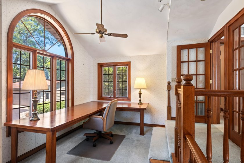 Classic lakefront architecture and timeless craftsmanship define - photo 37