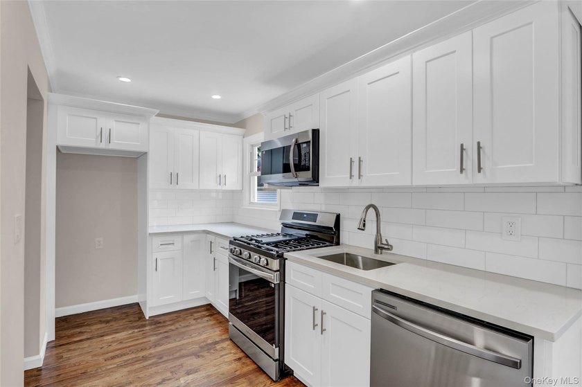 Outstanding and updated Cape Cod style home with gorgeous curb - photo 8