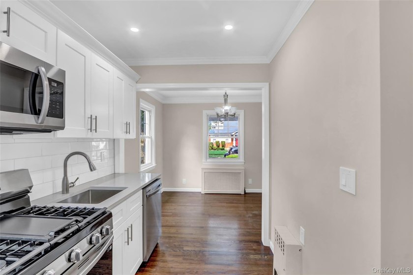 Outstanding and updated Cape Cod style home with gorgeous curb - photo 9