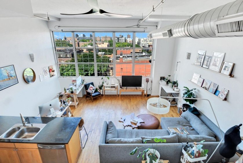LOFT OF A LIFETIME Experience elevated loft living in this - photo 3