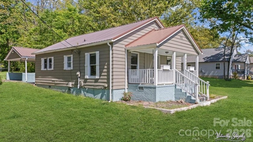 Charming farmhouse-style home offering the perfect blend of - photo 2