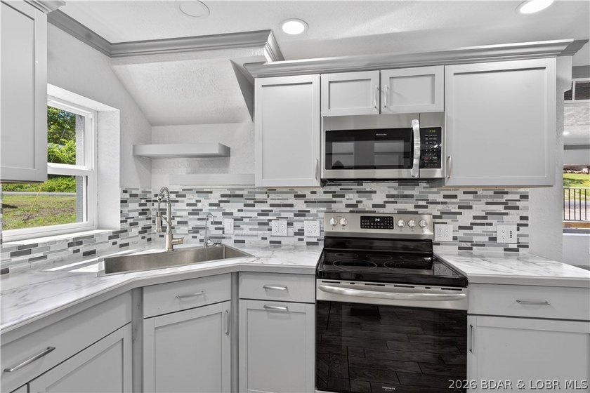 Lakefront, beautifully remodeled property, perfectly positioned - photo 25