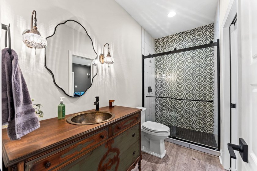 Nestled on 1.5 acres in Bellwood Landing, this custom-built home - photo 23