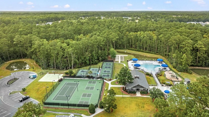 Nestled on 1.5 acres in Bellwood Landing, this custom-built home - photo 42