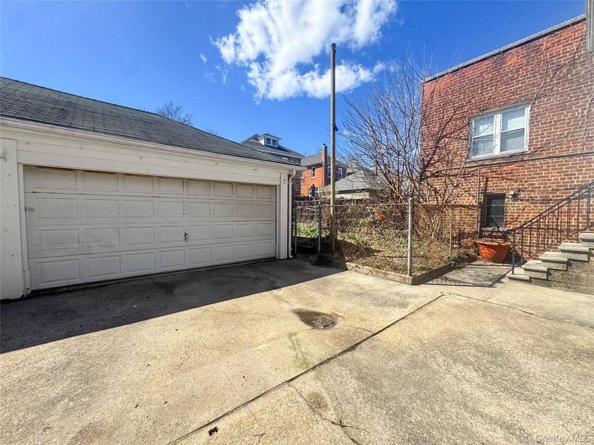 Welcome to 2021 Haight Avenue, a detached brick two family home - photo 4